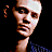 A static promotional graphic for the TV show 'One Tree Hill' featuring a character's face, network logo, and broadcast information on a black background with gray transparency area.