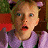A pixelated contact sheet showing two frames of an animated icon featuring a cartoon character with light brown hair and purple accessories against a green background with "Original Icons .com" text.
