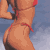Pixelated static image of a person in a bikini top against a blue gradient background with visible dithering and color banding.