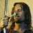 A contact sheet of two frames from an animated Lord of the Rings icon showing a character with long hair and beard holding a sword, with movie title text below.