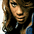 A 4-frame contact sheet of a pixelated animated icon featuring two distinct images of a woman with long brown hair on the left and blue background text/logo elements on the right, showing subtle facial expression changes across frames.
