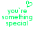 Green pixelated text reads 'you're something special' with a heart symbol above, displayed in two identical side-by-side on a white background