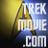 Pixelated static image showing a building with a golden dome and blue base, with large white text reading "TREK MOVIE.COM" on the right side.