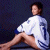 A pixelated image shows a person in white clothing sitting against a dark background, with green text reading "Original Icons .com" on the right side.