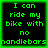 Four identical display green pixelated text on black backgrounds with green borders, each reading "I can ride my bike with no handlebars"