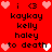 Red background with pixelated text and heart symbols arranged in two mirrored , featuring repeated phrases and alternating heart colors