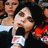 A pixelated image of a person holding a microphone with text overlays reading "Huh? What?" and "I don't get it...." on black and gray backgrounds.