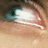 A close-up of a human eye with light skin tone, showing subtle animation changes across four
