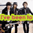 Three individuals in dark clothing stand together with guitars, text overlays change across frames.
