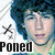 Pixelated image of a person with blue hair and light skin, wearing a green necklace, next to stylized text reading 'Poned' in bold black letters.