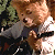 A 50x50 pixel animated contact sheet showing two frames of a cartoon character on the left and green text reading "Original Icons .com" on the right against a dark background.