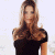 A pixelated image of a woman with long brown hair wearing a black off-shoulder top against a white background, next to green text reading "Original Icons .com" on dark green.