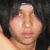 A person with shoulder-length dark hair and light skin appears in a of four , with the rightmost displaying text