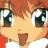 A 48x48 pixel animated buddy icon featuring a close-up of an anime-style character with orange hair and large green eyes on the left, paired with text reading "Anime IM" and "COM" on a black background to the right.