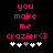 Pixelated pink text reads "you make me crazier<3" above five heart symbols on a black background, with one heart grayed out in the left view.