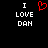 Black background with white pixelated text 'I LOVE DAN' on both sides and a red heart symbol between them.