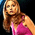 A pixelated image of a woman in a pink top on the left and green text reading "Original Icons .com" on the right, displayed as a contact sheet with two frames.