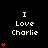Pixelated text "I Love Charlie" with red heart symbols varying in quantity across a black background