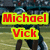 Football players in dark green uniforms on a field with red text reading Michael Vick Madden NFL 10 over yellow outlines.