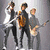 Four distinct show a group of young men in various poses with text and symbols