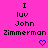 Pixelated text and heart symbols on a bright pink background with repeated patterns.
