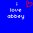 Blue background with white pixelated text 'i love abbey' on both sides and a red heart symbol above the left side.