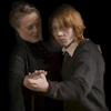 Animated sequence showing two characters in dark clothing holding hands, followed by a character with long white hair and beard pointing while text changes from 'HEY!' to 'HANDS' to 'HANDS OFF MY WOMAN, WEASLEY'.