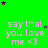 Green background with repeated text 'say that you love me <3' in light purple, scattered small stars in green and dark purple.