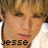 A 48x48 pixel buddy icon featuring a split composition with text and partial imagery, including the name "jesse" and the phrase "I could kiss him all day" on a blue background, plus "Buddy Putty .com" in brown text on a light pink section.