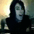 A split-screen image with a person on the left and another on the right, red text reading "i love you ronnie<3" below.