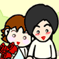 Two cartoon characters stand side-by-side; one holds red roses, both have blushing cheeks and heart-shaped mouths.