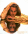 Pixelated image of a person with long brown hair wearing an orange top, arms crossed over chest against white background.