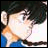 Pixelated anime-style character with dark hair and blue clothing, side profile against black background with stylized text.