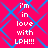 A static image with a bright pink background and blue diamond-shaped patterns, displaying repeated white text that reads "I'm in love with LPH!!!".