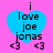 Blue heart-shaped icon with black text "i love joe jonas" and two pink '<3' symbols on a bright pink background.