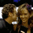 A pixelated animated contact sheet showing two frames of a woman with curly brown hair and the word "honey" in blue text on a dark background.
