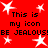 Red background with white stars and repeated black text reading 'This is my icon BE JEALOUS!BE JEALOUS!' in pixelated font.
