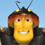 Pixelated cartoon bee character with yellow face, red-brown hair, black antennae, and dark clothing against light blue background.