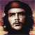 Pixelated portrait of a person with long dark hair wearing a red cap, set against a gradient background of purple and orange hues.