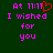 Green background with pink pixelated text reading 'At 11:11 I wished for you' and a red heart symbol replacing the number one in '11:11'.