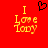 Red background with yellow text reading "I Love Lady" and a black pixelated heart above the left side of the text.