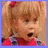 Pixelated image of a child with blonde pigtails and red hair ties, wearing a pink top with dark patterns, next to pixelated text on a light blue background.