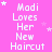 Pink background with white text reading "Madi Loves Her New Haircut" repeated in a , surrounded by small white stars