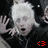 A person with white hair and dark clothing appears in a of four , with red pixelated symbols in the bottom-right of each