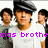 Three pixelated figures in white shirts stand side-by-side with a purple text overlay reading 'nas brothe' on a white background.