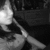 A grayscale pixelated image shows a stylized figure with a bright light source on the left, casting a diagonal shadow across a dark background.