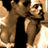 Pixelated static image of two figures in close embrace with warm brown and beige tones, likely from a vintage movie or theatrical production.