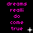 Pixelated text 'dreams realli do come true' in bright pink on black background with white star and dot animations.