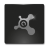 Pixelated grayscale icon with abstract shape resembling a stylized target or crosshair on dark background.