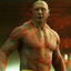 Pixelated static image of a shirtless muscular man with light hair standing against a dark background, likely from a TV show or movie character icon.